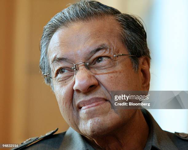 Mahathir Mohamad, Malaysia's former prime minister, pauses during an interview at his office, in Putrajaya, Malaysia, on Wednesday, Oct. 22, 2008....