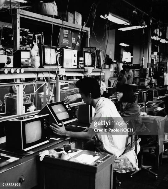 Toshiba Electric CO.Ltd. Kawasaki, komukai Works. Checking TV sets at finishing line N1, Kawasaki, Japan in 1970.