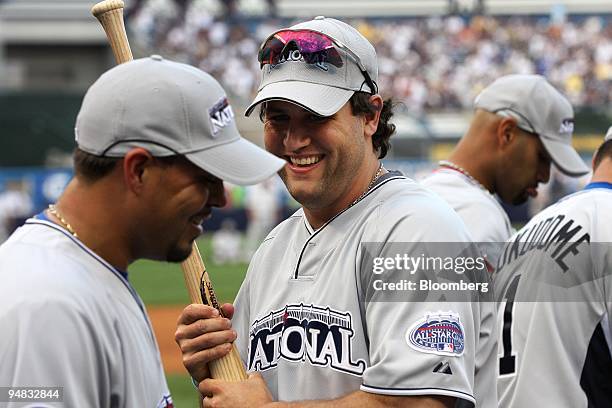 Lance Berkman of the Houston Astros, center, smiles during batting practice before the 79th Major League Baseball All-Star Game at Yankee Stadium in...