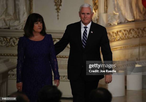 Vice President Mike Pence and his wife Karen Pence arrive before the start of a news conference held by President Donald Trump and Prime Minister...