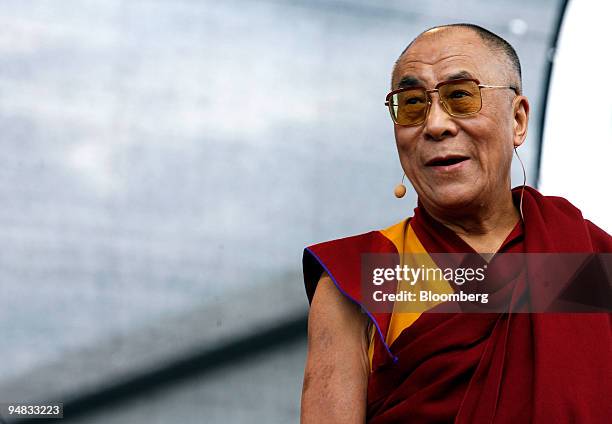 Tenzin Gyatso, the 14th Dalai Lama, speaks in Berlin, Germany, on Monday, May 19, 2008. German Development Minister Heidemarie Wieczorek-Zeul...