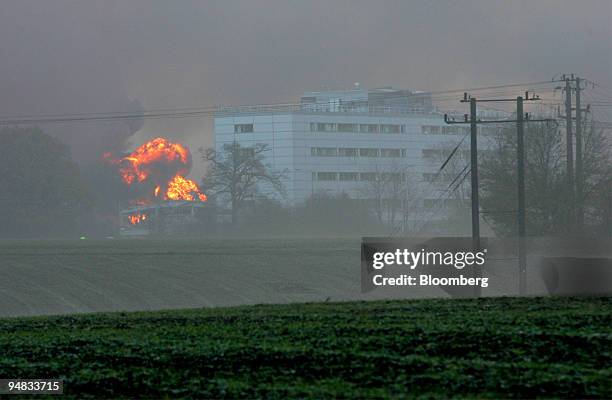 Flames rise from the Buncefield Fuel Depot, in Hemel Hempstead, England, Sunday, December 11, 2005. The depot operated by Total SA and Chevron Corp....