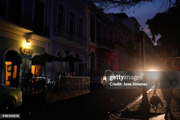 Tourists dine Cafe Puerto RIco on April 18, 2018 in Old San Juan, Puerto Rico as a major failure knocked out the electricity in Puerto Rico today,...