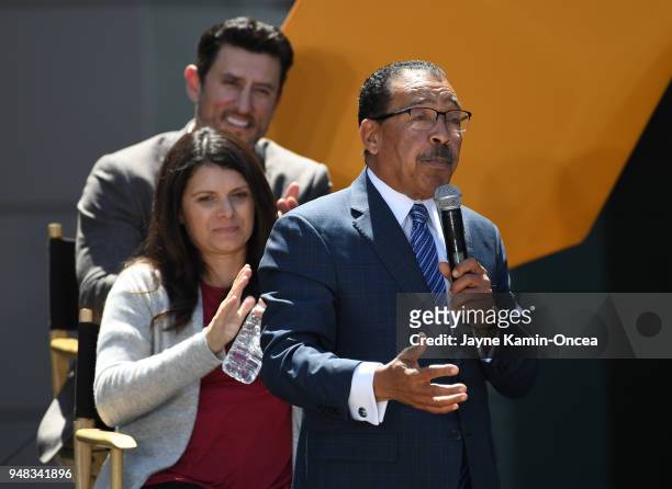 Owners Nomar Garciaparra and Mia Hamm-Garciaparra applaud as Los Angeles City Council President Herb Wesson speaks to fans and media at the ribbon...