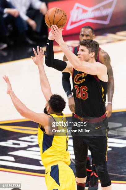 Kyle Korver of the Cleveland Cavaliers shoots over Cory Joseph of the Indiana Pacers during the first half of Game 2 of the first round of the...