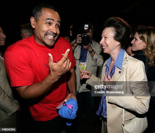 The Princess Royal, right, celebrates with decathlete Daley Thompson after the International Olympics Committee awarded the 2012 Olympics to London...
