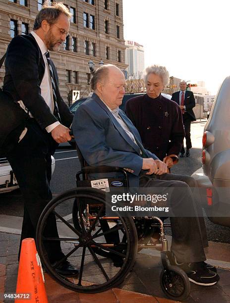John McDarby, in wheelchair, his wife Irma, right, and his attorney Jerry Kristal, left, arrive at the Atlantic County Civil Courts Building in...