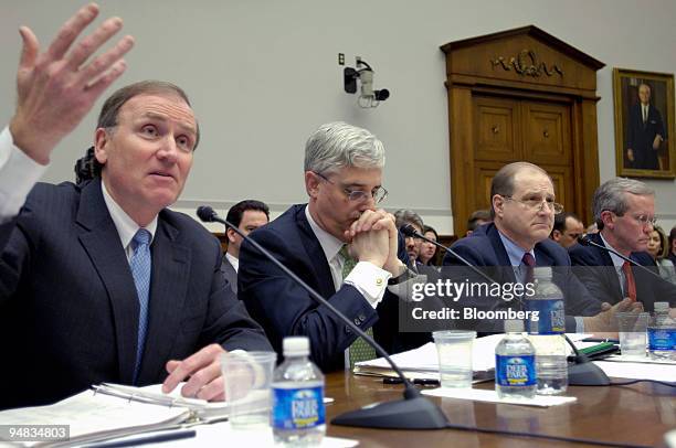 Robert Kimmitt, Deputy Secretary at the U.S. Department of Treasury, gesturing on far left; Michael Jackson, deputy secretary of homeland security,...