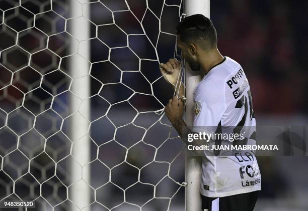 Brazil's Corithians forward Clayson reacts after his teammate forward Angel Romero missed a chance to score against Argentina's Independiente, during...