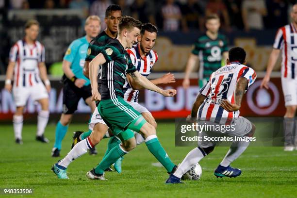 Dylan Vente of Feyenoord, Ismail Azzaoui of Willem II, Giliano Wijnaldum of Willem II during the Dutch Eredivisie match between Willem II v Feyenoord...