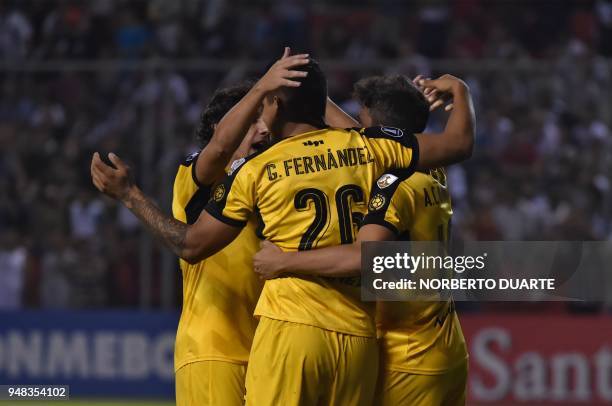 Gabriel Fernandez of Uruguay's Penarol celebrates with teammates after scoring against Paraguay's Libertad during their 2018 Libertadores Cup...