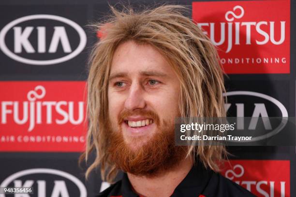 Dyson Heppell of the Bombers speaks to the media before an Essendon Bombers traing session on April 19, 2018 in Melbourne, Australia.