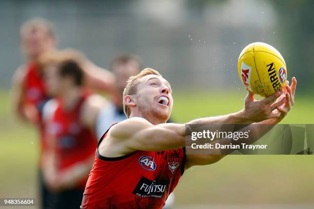 Devin Smith of the Bombers marks the ball during an Essendon Bombers traing session on April 19, 2018 in Melbourne, Australia.