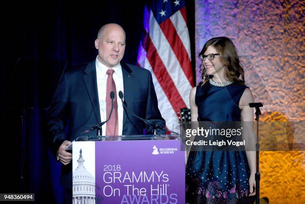 Chair of the Board for The Recording Academy, John Poppo speaks onstage with recording artist Lisa Loeb during Grammys on the Hill Awards Dinner on...