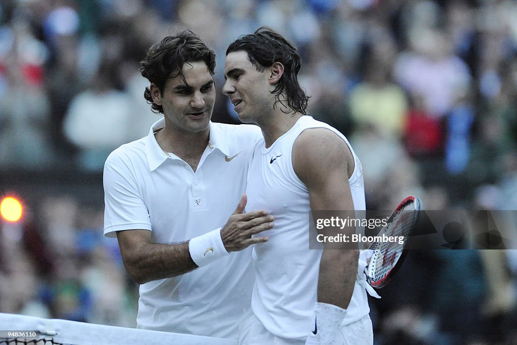Roger Federer of Switzerland congratulates Rafael Nadal of S