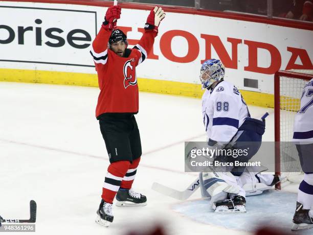 Patrick Maroon of the New Jersey Devils celebrates a first-period goal by Kyle Palmieri against Andrei Vasilevskiy of the Tampa Bay Lightning in Game...