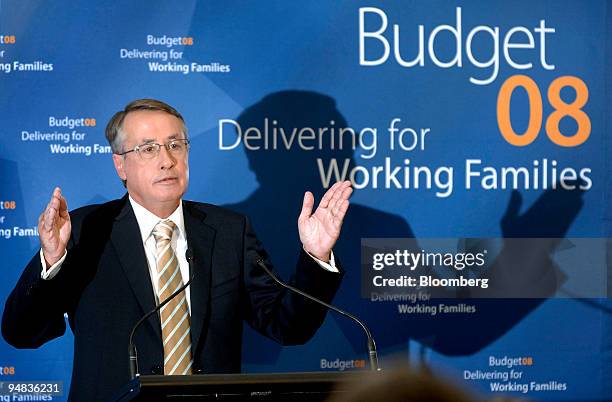 Wayne Swan, Australia's federal treasurer, speaks to reporters after tabling his budget at Parliament House in Canberra, Australia, on Tuesday, May...