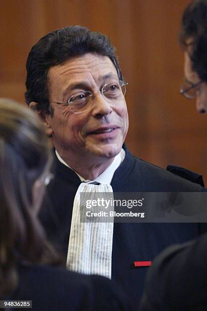 George Soros' lawyer Jean-Michel Darrois appears in the tribunal in Paris, France, on February 10, 2005. Soros told a French court he didn't consider...