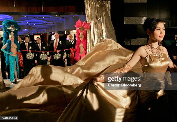 Miss China, seen front right at the opening of the Sands Casino in Macau, Monday, February 7, 2005. Also seen are Frank P McFadden, fourth left,...