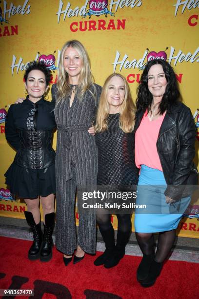 Actress Gwyneth Paltrow poses for photos with original members of The Go-Go's Jane Wiedlin, Charlotte Caffey, and Kathy Valentine on the red carpet...
