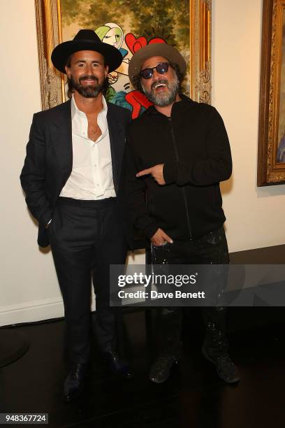 Jay Rutland and Mr Brainwash attend a private view of "Keep Smiling", a new exhibition by Mr Brainwash, at Maddox Gallery, Westbourne Grove, on April...