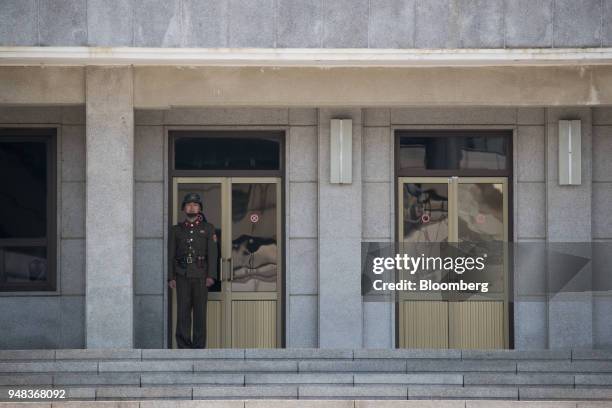 North Korean soldier stands guard outside the Panmungak building on the North Korean side of the truce village of Panmunjom in the Demilitarized Zone...