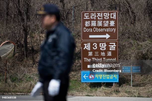 Security guard stands next to signage at the Customs, Immigration and Quarantine office near the demilitarized zone in Paju, South Korea, on...