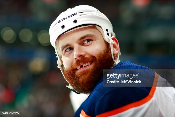 Zack Kassian of the Edmonton Oilers looks on from the bench during their NHL game against the Vancouver Canucks at Rogers Arena March 29, 2018 in...