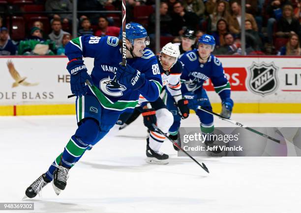 Adam Gaudette of the Vancouver Canucks skates up ice during their NHL game against the Edmonton Oilers at Rogers Arena March 29, 2018 in Vancouver,...