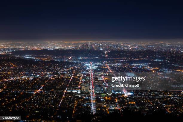 downtown los angeles and glendale at night - glendale california stock pictures, royalty-free photos & images