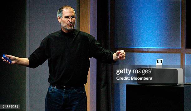 Steve Jobs, Apple Computer chief executive officer, stands next to the new iPod Hi-Fi stereo system in Cupertino, California on Tuesday, February 28,...