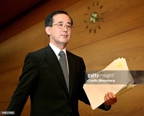 Masaaki Shirakawa, governor of the Bank of Japan, leaves a news conference in Tokyo, Japan, on Tuesday, Oct. 7, 2008. The Bank of Japan acknowledged...
