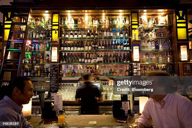Patrons drink at "Carnegie's" bar in Hong Kong, China, on Thursday, May 8, 2008. "Carnegie's," located at 53-55 Lockhart Rd. In the Wan Chai...