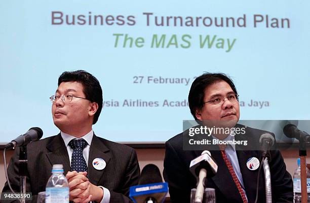 Malaysian Airline System Bhd. Managing Director Idris Jala, right, and CFO Azmil Zahruddin Raja Aziz speak at a briefing in Kelana Jaya, Malaysia...