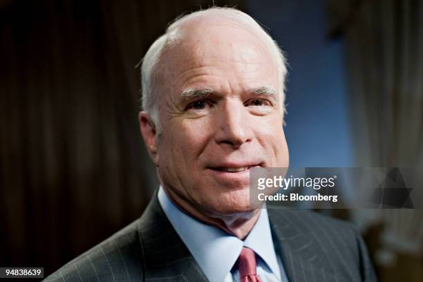 Senator John McCain, the presumptive Republican presidential nominee, sits for a photograph between interviews in New York, U.S., on Tuesday, June...