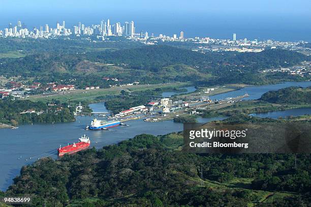 Ships cross Miraflores Locks in the Pacific end of the Panama Canal, Monday, January 31, 2005. The three sets of locks of the two-lane canal work as...