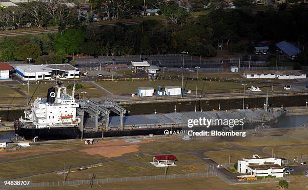 Cargo ship passes through Miraflores Locks in the Pacific end of the Panama Channel, January 31st, 2005. The three sets of locks of the two-lane...