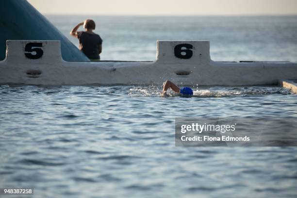 morning swim routine at ocean baths - newcastle new south wales stock pictures, royalty-free photos & images