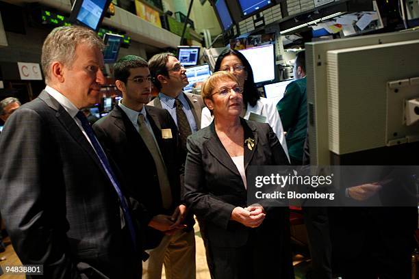 Ester Levanon, chief executive officer of the Tel Aviv Stock Exchange, center, tours the floor of the New York Stock Exchange with Duncan Niederauer,...