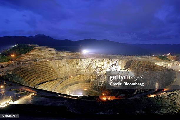 Newmont Nusa Tenggara's massive Batu Hijau copper mining pit on the southwestern tip of the Indonesian island of Sumbawa, at dusk on Thursday,...