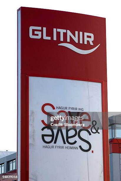 The Glitnir Bank company logo stands outside their headquarters in Reykjavik, Iceland, on Wednesday, Oct. 1, 2008. Arni Einarsson looks out over the...