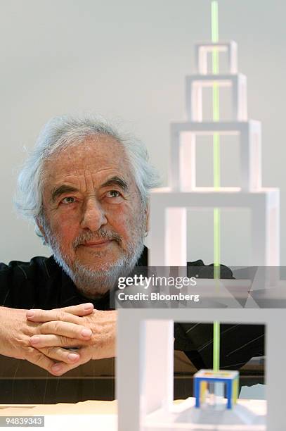 Artist Daniel Buren poses next to a model of his shortlisted proposal, which he called 'Signal' at Ebbsfleet International Station, Kent, U.K., on...