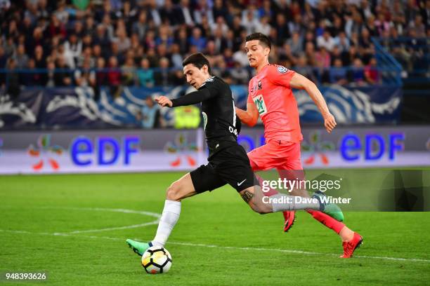 Angel Di Maria of PSG and Stef Peeters of Caen during the French Cup Semi Final match between Caen and Paris Saint Germain on April 18, 2018 in Caen,...