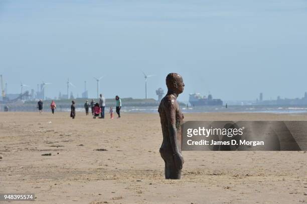 Sculptures from Another Place by Anthony Gormley at Crosby Beach on May 24, 2016 in Liverpool, England. The one hundred cast-iron life-size figures...