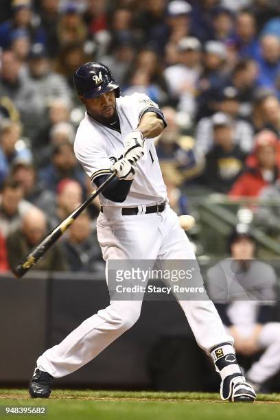 Domingo Santana of the Milwaukee Brewers at bat during a game against the Cincinnati Reds at Miller Park on April 17, 2018 in Milwaukee, Wisconsin....