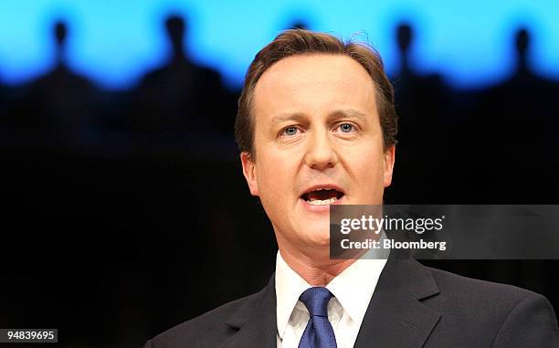 David Cameron, leader of the U.K. Conservative Party, center, delivers his keynote speech at the annual Conservative Party Conference in Birmingham,...