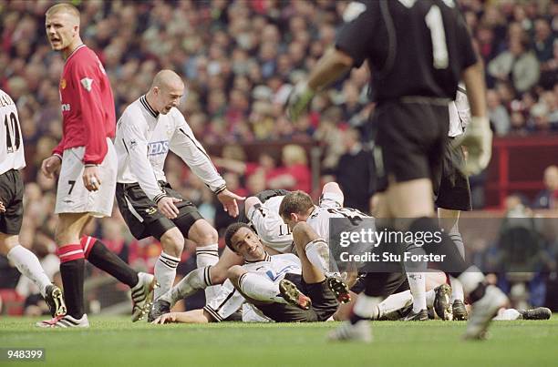 Derby celebrate Malcolm Christie's winning goal during the FA Carling Premier League match against Manchester United played at Old Trafford in...