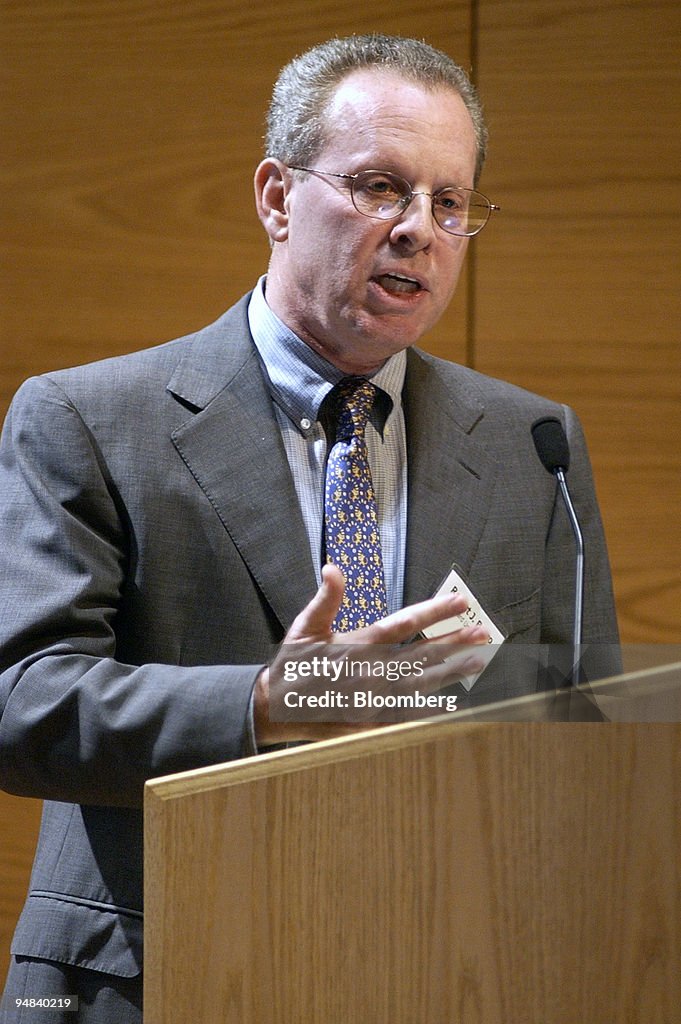 Robert J. Barro, an economist at Harvard University, gesture