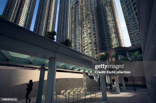 sunny morning at union square in hong kong - commercial buildings hong kong morning stock pictures, royalty-free photos & images