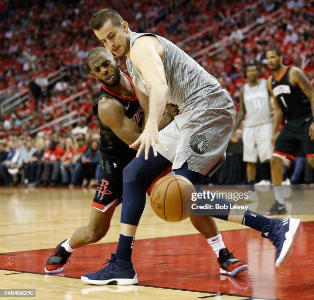 Chris Paul of the Houston Rockets knocks the ball away from Nemanja Bjelica of the Minnesota Timberwolves during Game Two of the first round of the...